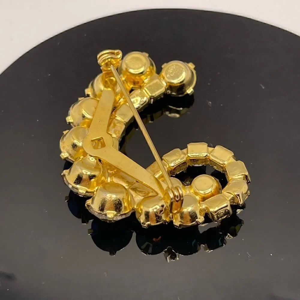 Vintage brooch aurora borealis gold tone